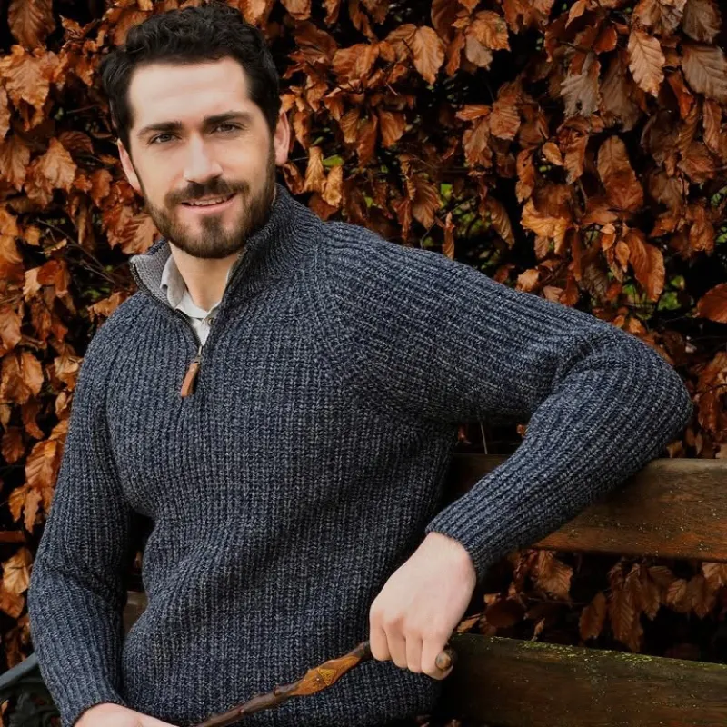 Man wearing a traditional Irish Aran sweater from Lowry's, Clifden
